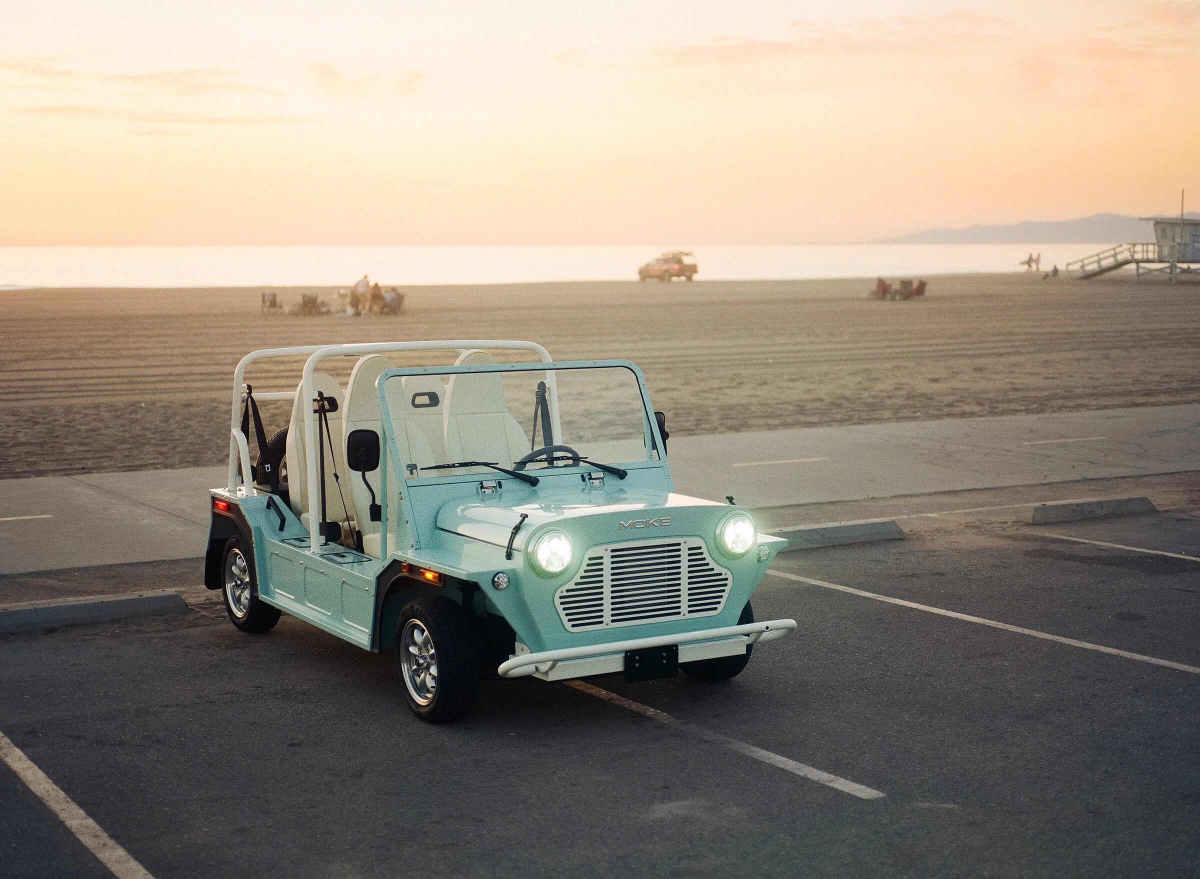 Moke by the coast in warm sunset light