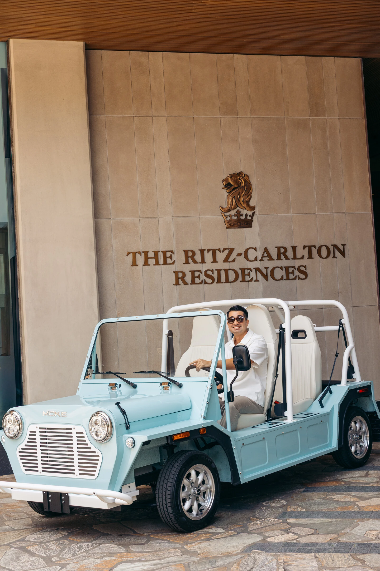 Moke waiting at a resort entrance